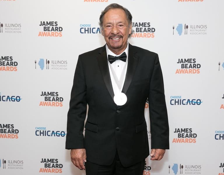 La Taqueria founder Miguel Jara wearing the James Beard Foundation medal at the James Beard Awards