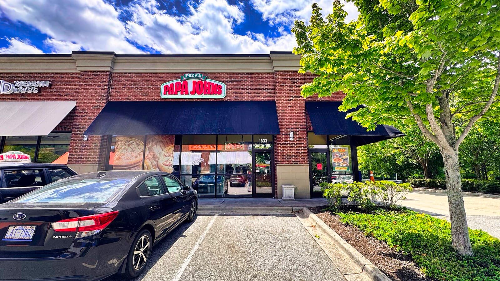 The exterior of a Papa John's